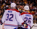 Zdeno Chara chats with Travis Moen and Josh Gorges. Royalty Free Stock Photo