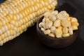 Zea mays - Wooden bowl with fresh corn kernels Royalty Free Stock Photo