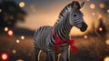 Adorable Zebra Foal with Red Bow at Sunset Royalty Free Stock Photo