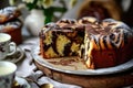 Zebra marble cake dessert. Striped sugary brown sponge biscuit with frosting