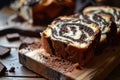 Zebra marble cake dessert. Striped sugary brown sponge biscuit with frosting