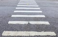 Zebra way on asphalt road surface