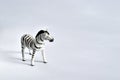 Zebra on white. Made of plastic. Side view Royalty Free Stock Photo