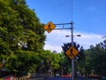 zebracross symbol mounted on a pole.