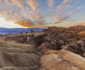 Zebriski point sunset- desert life - mountains in the background in death valley