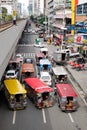 Zeepneys on street at Chinatown in Manila, Philippines Royalty Free Stock Photo
