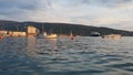 Zelenika, Herceg Novi, Montenegro, 08.13.2022 Boats are at anchor, a yacht is turning around. Sunny beautiful summer