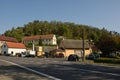 Zelizy, Czech republic - September 28, 2018: route 9, parked cars, houses and hill in Zelizy village in Machuv kraj tourist area