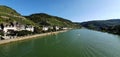 Zell Mosel germany September 2019 pedestrian bridge towards Zell centre beautiful weather blue sky Mosel houses vinyards