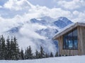 Zell Am See, AUSTRIA, March 14, 2019: view on modern wooden cottage restaurant on the top of Smittenhohe mountain at