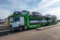 ZELVA, BELARUS - SEPTEMBER 2019: Car carrier truck loaded with many cars in the parking lot