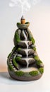 Zen Backflow Incense Burner with Smoke Waterfall Royalty Free Stock Photo