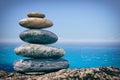 Zen Balancing Pebbles on sea background Royalty Free Stock Photo