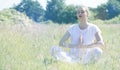 Zen beautiful young yoga woman breathing, soft vintage toned effects