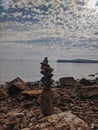 Zen.  A big pyramid of small stones on the seashore at Adriatic seaside in Piran. Meditation, balance, pray concept. tranquil Royalty Free Stock Photo