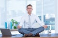 Zen businessman doing yoga meditation Royalty Free Stock Photo