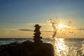 Zen concept. The object of the stones on the beach at sunset. Harmony & Meditation.