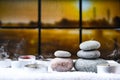 Zen concept, spa pebbles stones and burning aroma candles smoke, Treatment aromatherapy and massage copy space Royalty Free Stock Photo