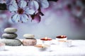 Zen concept, spa pebbles stones and burning aroma candles, Treatment aromatherapy and massage copy space Royalty Free Stock Photo