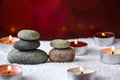 Zen concept, spa pebbles stones and burning aroma candles, Treatment aromatherapy and massage copy space Royalty Free Stock Photo