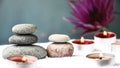 Zen concept, spa pebbles stones and burning aroma candles, Treatment aromatherapy and massage copy space Royalty Free Stock Photo