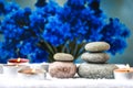 Zen concept, spa pebbles stones and burning aroma candles, Treatment aromatherapy and massage copy space Royalty Free Stock Photo