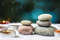 Zen concept, spa pebbles stones and burning aroma candles, Treatment aromatherapy and massage copy space Royalty Free Stock Photo