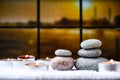Zen concept, spa pebbles stones and burning aroma candles, Treatment aromatherapy and massage copy space Royalty Free Stock Photo