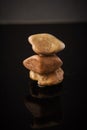 Stones arranged against black background Royalty Free Stock Photo