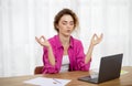 Zen Concept. Female Freelancer Sitting At Desk And Meditating With Eyes Closed Royalty Free Stock Photo