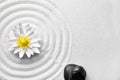 Zen garden. Beautiful lotus flower, stones and space for text on white sand Royalty Free Stock Photo