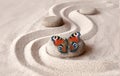 zen garden meditation stone background and butterfly with stones and lines in sand for relaxation balance and harmony Royalty Free Stock Photo