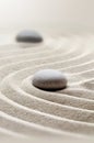 Zen garden meditation stone background with stones and lines in sand for relaxation Royalty Free Stock Photo