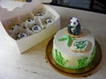 Zen garden, panda bear fondant cake. Funny bamboo, cake creem cheese with cupcakes in the box