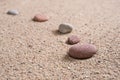 Zen garden sand waves and rock sculptures Royalty Free Stock Photo