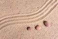 Zen garden sand waves and rock sculptures Royalty Free Stock Photo