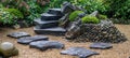 Zen garden tranquility balanced thuja branches stones for calming japanese ambiance Royalty Free Stock Photo