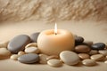 Minimalist Spa Composition with Candlelight and Round Stones Royalty Free Stock Photo