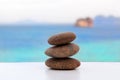 Rock cairn on tropical beach. Royalty Free Stock Photo