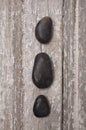 Zen Massage Stones on Rustic Wood Royalty Free Stock Photo