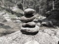 Zen meditation background, balanced piles stacked in black and white water Royalty Free Stock Photo