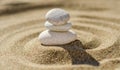 zen meditation stone in sand, concept for purity harmony and spirituality, spa wellness and yoga background Royalty Free Stock Photo