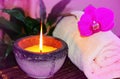 Zen orchid aromatic candle and towel spa concept