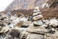 Zen rock arrangement that mimic the Stupa along hiking trail to the mountains of Annapurna, Nepal Royalty Free Stock Photo