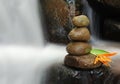 Zen rock on flowing water Royalty Free Stock Photo
