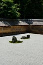 Zen rock garden of Ryouanji Temple, Kyoto Japan. Royalty Free Stock Photo