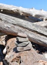 Zen rock pile on drift wood along the shore of Lake Superior Royalty Free Stock Photo