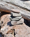 Zen rock pile on drift wood along the shore of Lake Superior Royalty Free Stock Photo