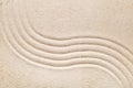 Zen sand and stone garden with raked lines, curves and circles. Royalty Free Stock Photo
