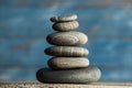 Zen sculpture. Harmony and balance, cairn, poise stones on wooden table Royalty Free Stock Photo